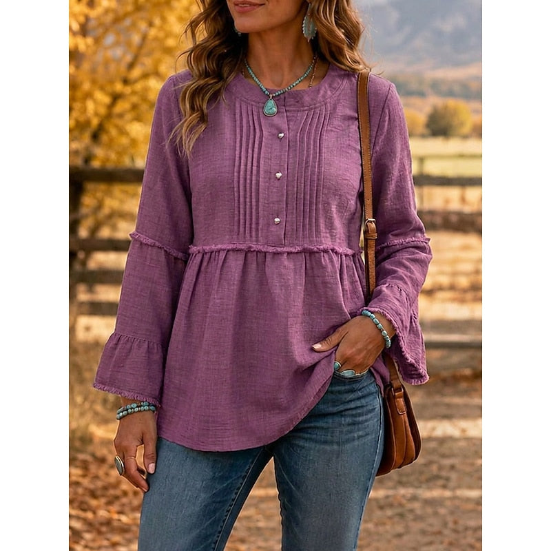 Purple pintucked peplum blouse with button-front and long flared sleeves