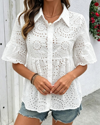 White embroidered button-front peplum blouse with eyelet cutwork details