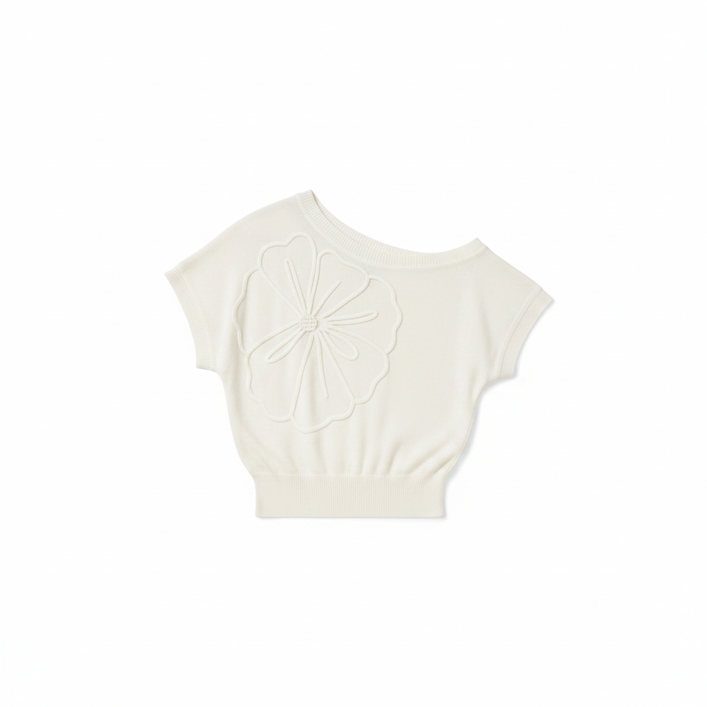 White one-shoulder knit top with floral applique and short batwing sleeves