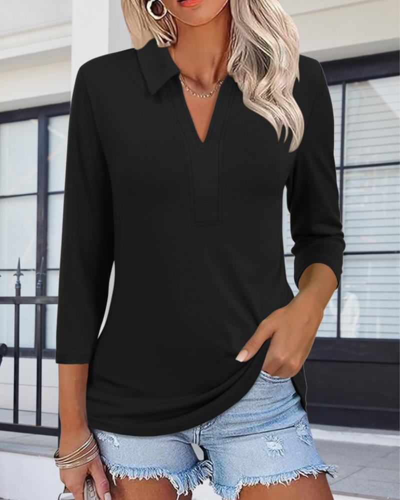 Women's polo shirt with V-neck and 3/4 sleeves, solid black pullover style.