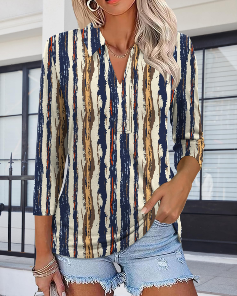 Women's polo shirt with V-neck and 3/4 sleeves, navy and beige vertical stripe print.