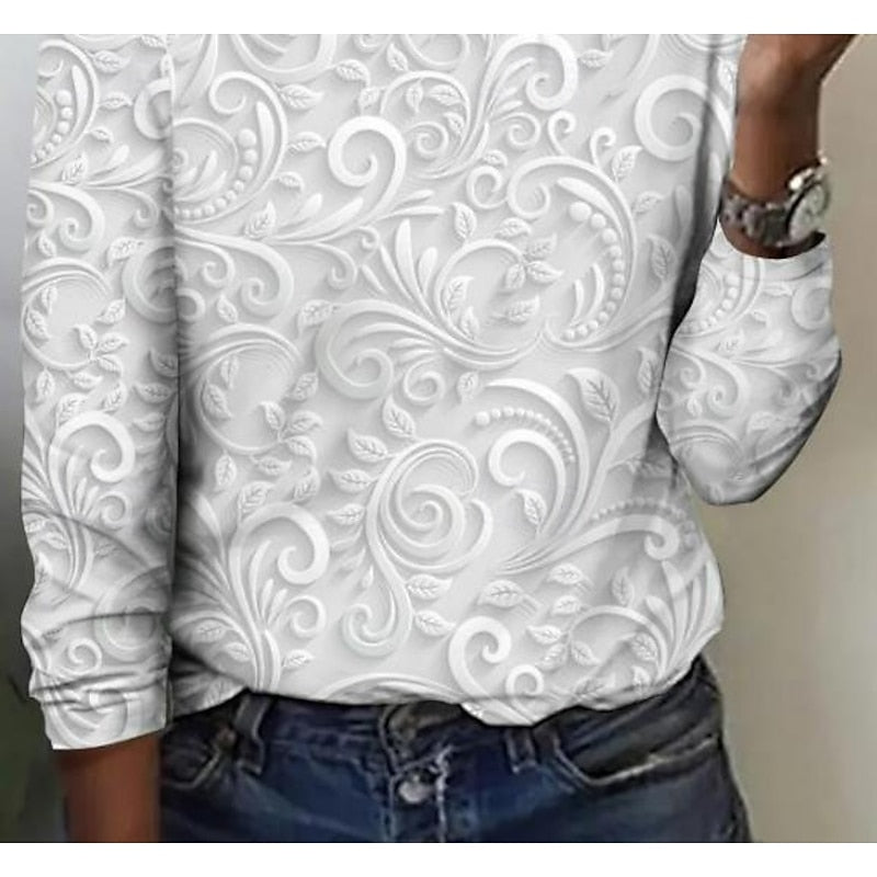 Pearl long-sleeve tunic with embossed floral scroll pattern and curved hem