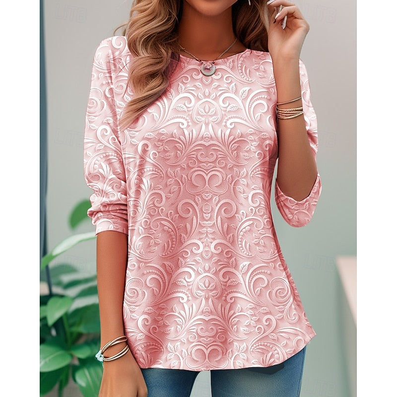 Pink long-sleeve tunic with embossed floral scroll pattern and round neckline
