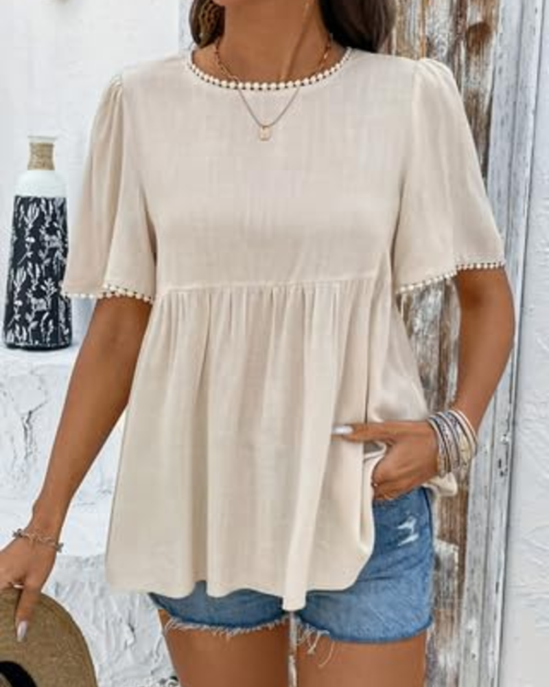 Beige round-neck peplum t-shirt with textured fabric and pearl-trim sleeves