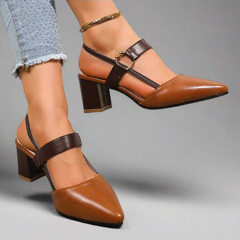 Brown slingback block heels with pointed toe, black buckle strap and strap details