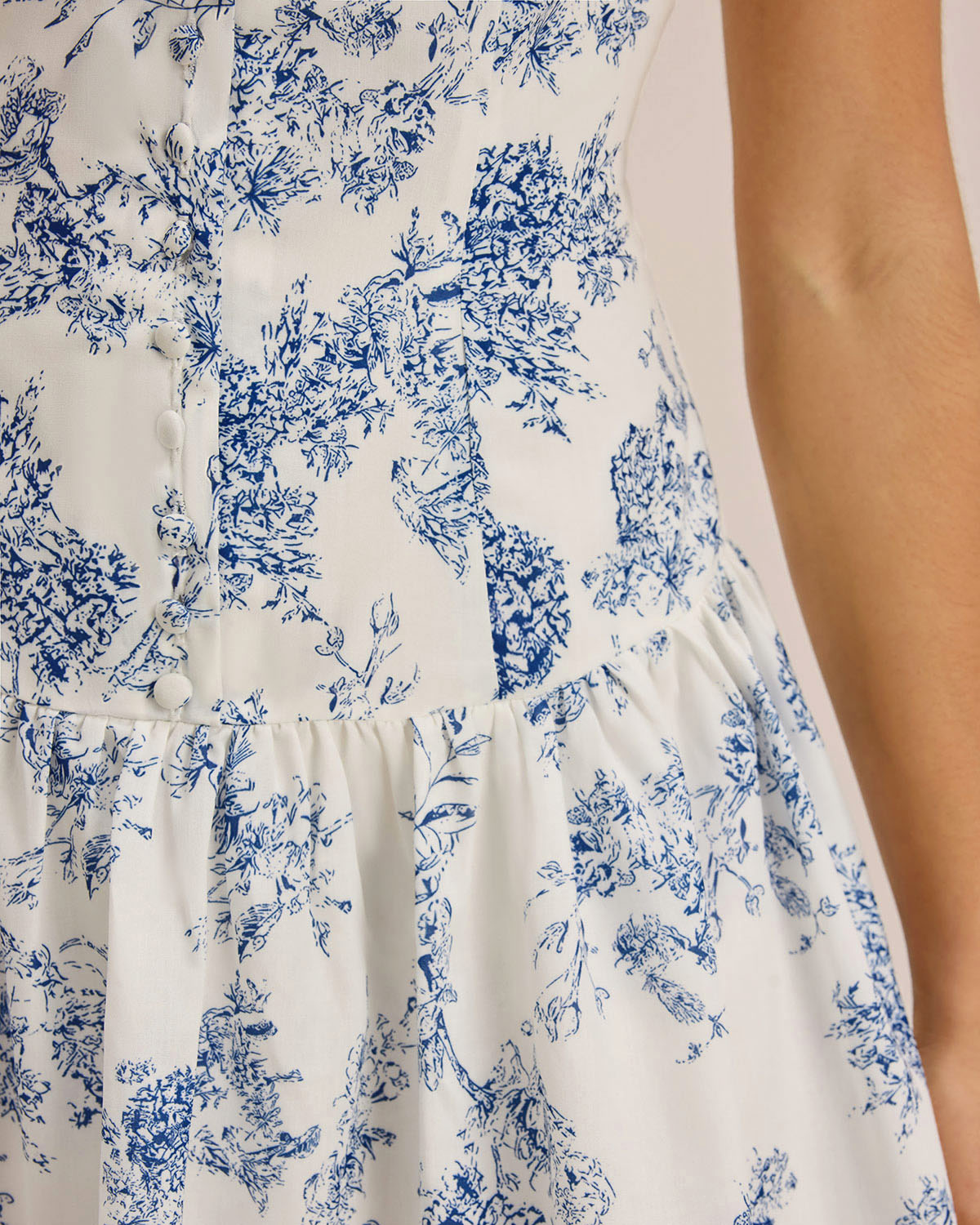 Floral print mini dress bodice and gathered skirt, blue blooms on white