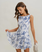Floral print A-line mini dress with boat neck and sleeveless bodice, blue on white