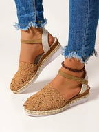 Brown crochet espadrille sandal with ankle strap and jute-style wedge sole