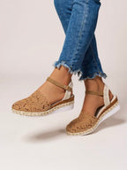 Brown crochet espadrille sandals with ankle strap and low jute-style wedge