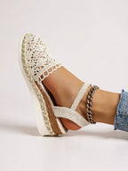 Beige crochet espadrille sandal with ankle strap and cross-strap upper