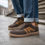 Brown low-top lace-up sneakers with contrast panel details, synthetic upper