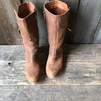 Pair of brown mid-calf side-zip boots, textured upper and low block heels