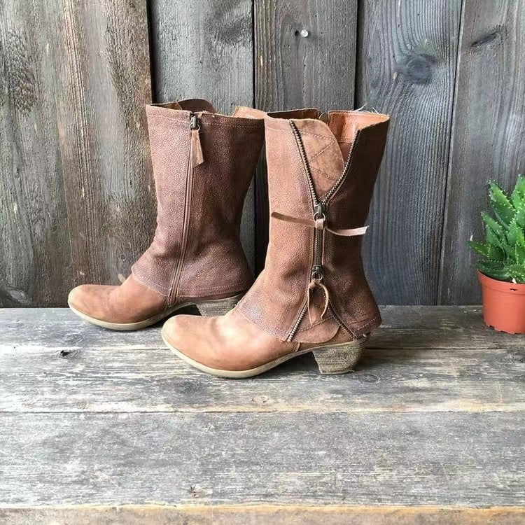 Brown mid-calf side-zip boots with stitched paneling and low block heels