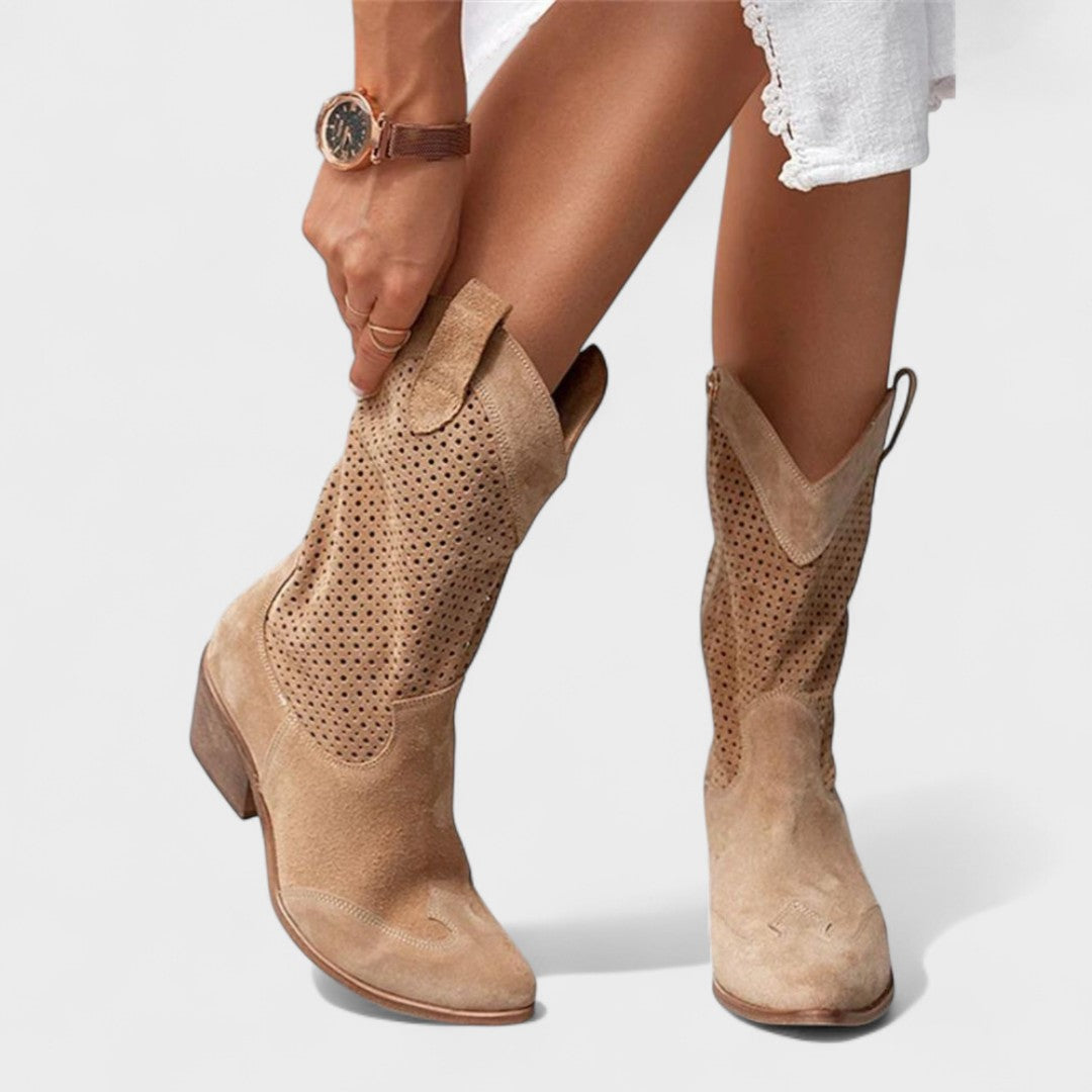 Tan mid-calf perforated boots for women with curved pull-on shaft and heel