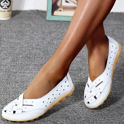 White leather orthopaedic loafers with perforated design and gel-style cushioned sole, slip-on