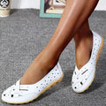 White leather orthopaedic loafers with perforated design and gel-style cushioned sole, slip-on