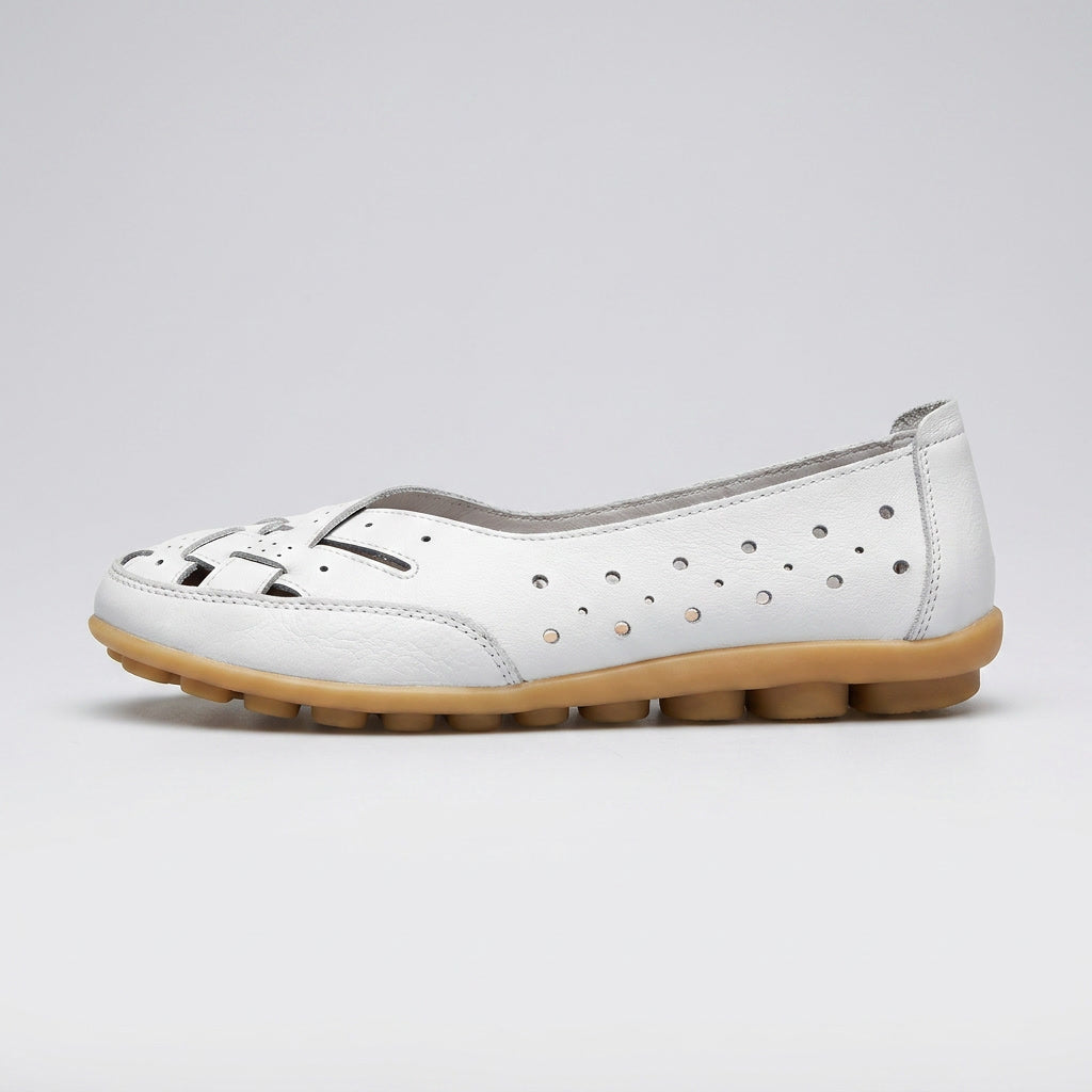 White perforated leather loafer, slip-on design with cushioned outsole