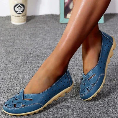 Blue leather loafers with perforated upper and woven strap detail, cushioned sole