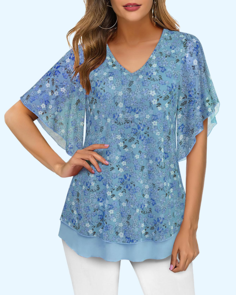 Blue floral V-neck knit blouse with short ruffled sleeves and layered bottom
