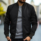 Men's lightweight bomber jacket in black, full-zip front, ribbed cuffs and hem