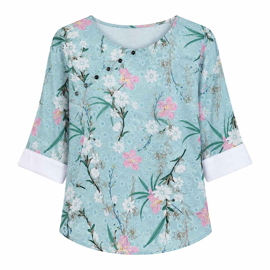 Blue-green floral print blouse with round neck and short sleeves, button front.