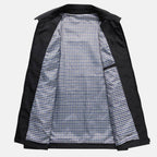 Black jacket interior with checked lining and folded stand collar