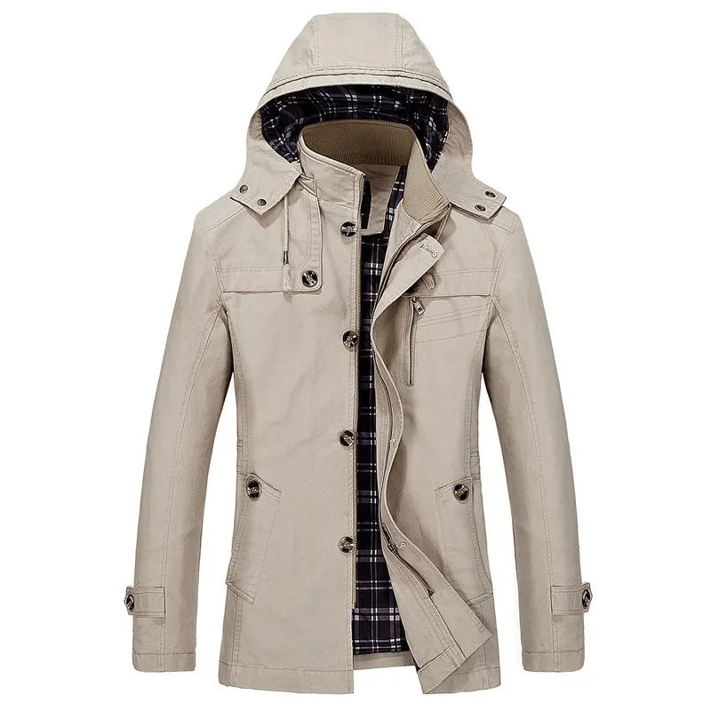 Beige hooded field coat with plaid-lined hood, snap-button front, flap pockets.