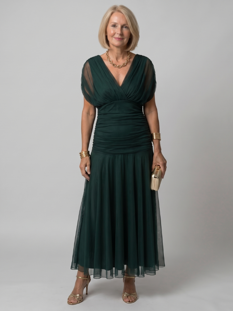 Dark green midi dress with ruched V-neck bodice and flared chiffon skirt