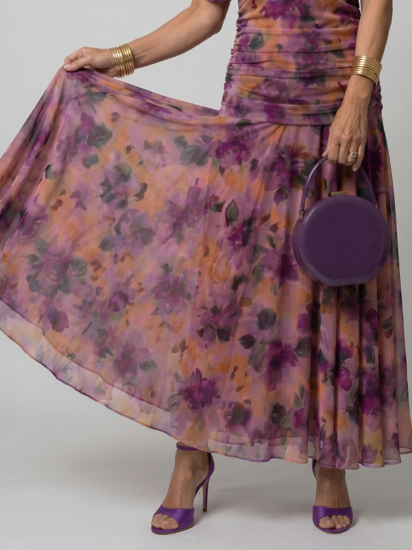 Off-shoulder purple floral midi dress with sheer flared skirt and ruched bodice