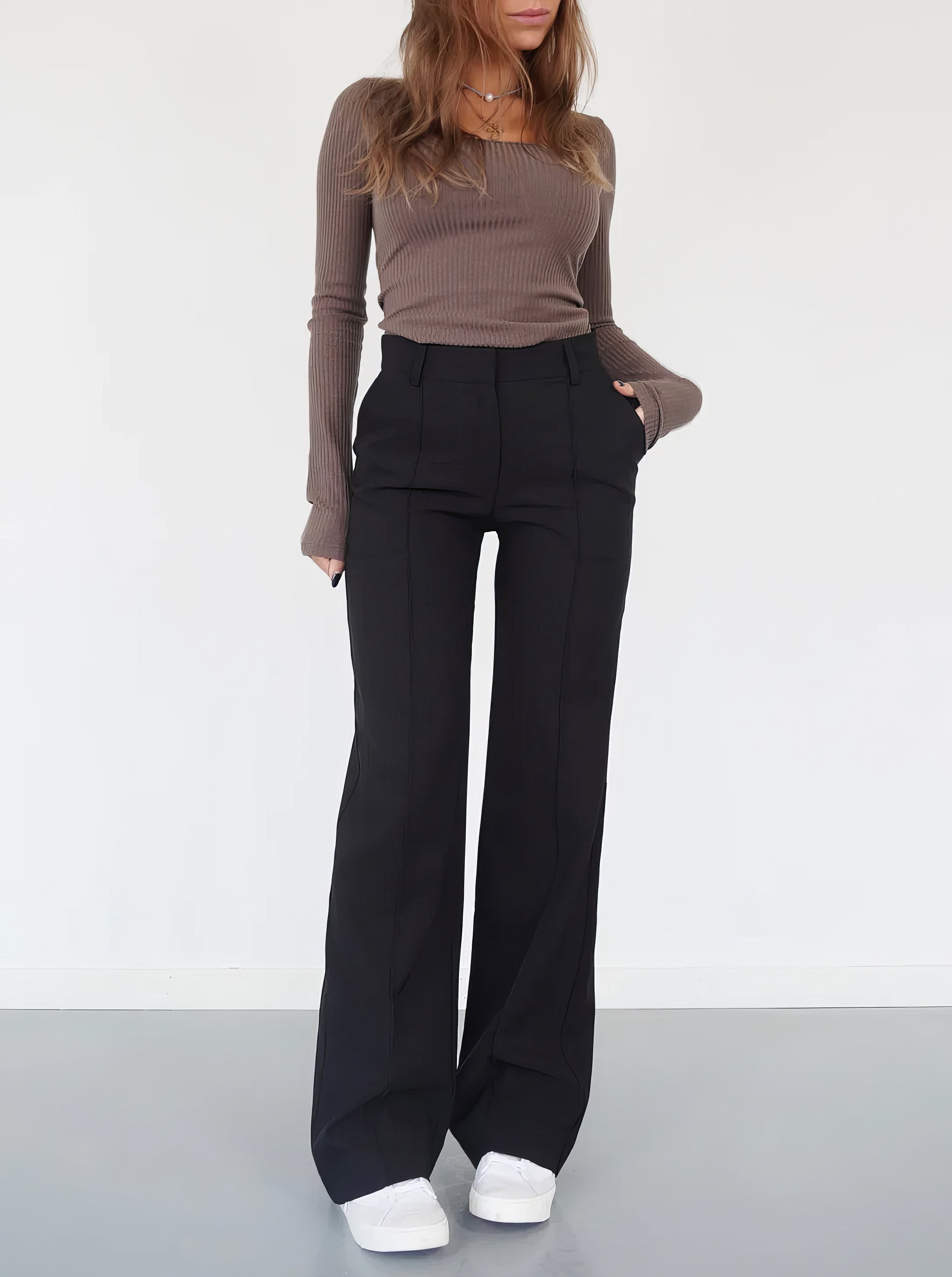 Black relaxed wide-leg trousers with high rise and straight, roomy legs