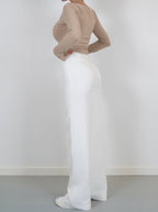 White relaxed wide-leg trousers with high waist and wide flared leg