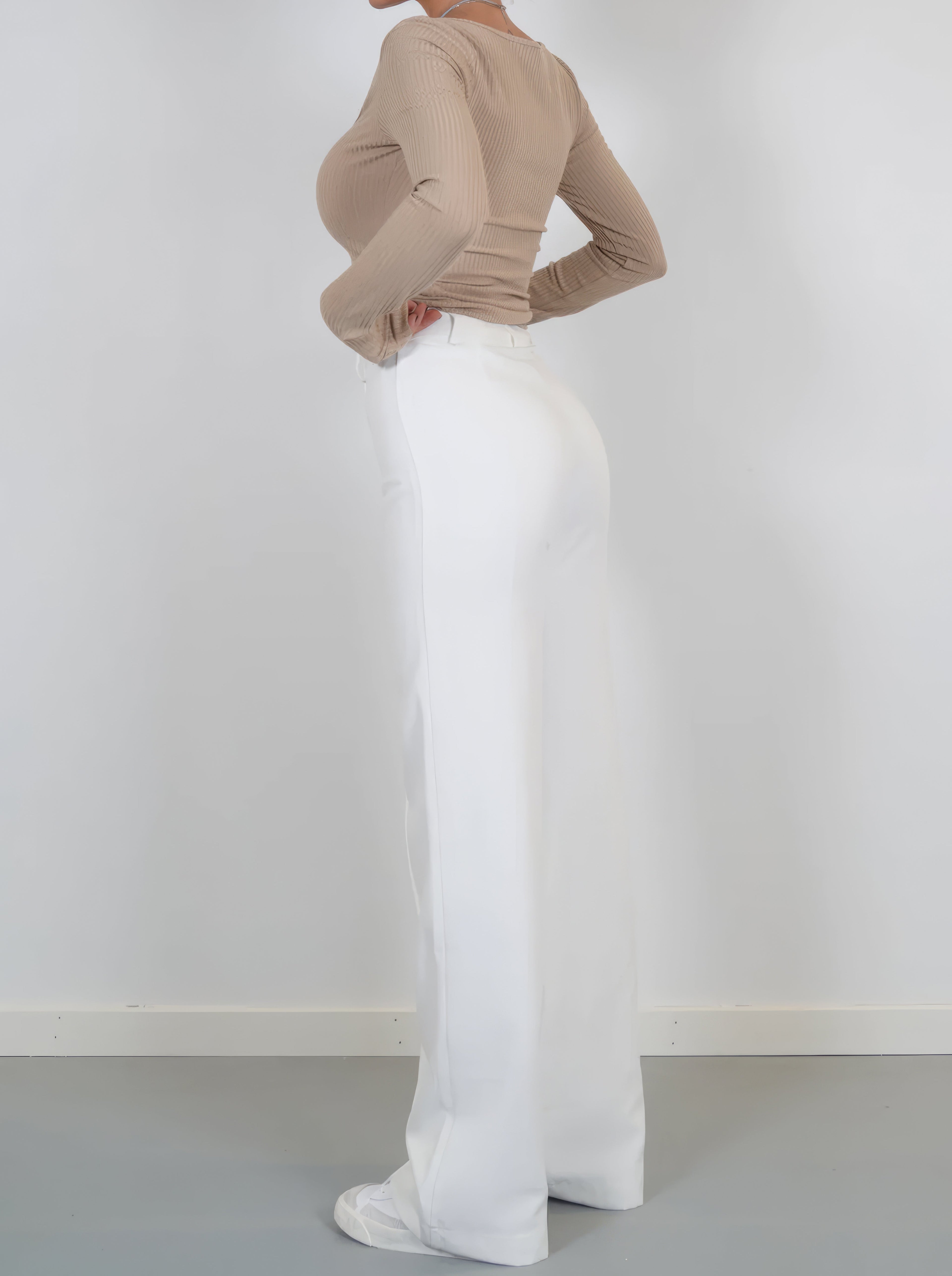 White relaxed wide-leg trousers with high waist and wide flared leg