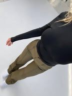 Dark olive relaxed wide-leg trousers with wide, straight fall and clean seams