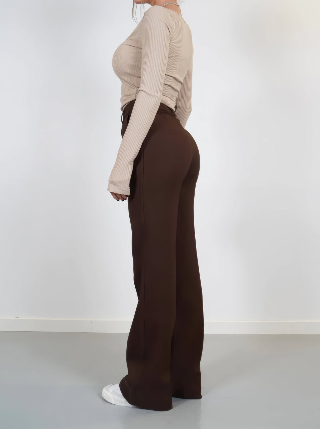 Brown relaxed wide-leg trousers with high rise and wide, drapey leg
