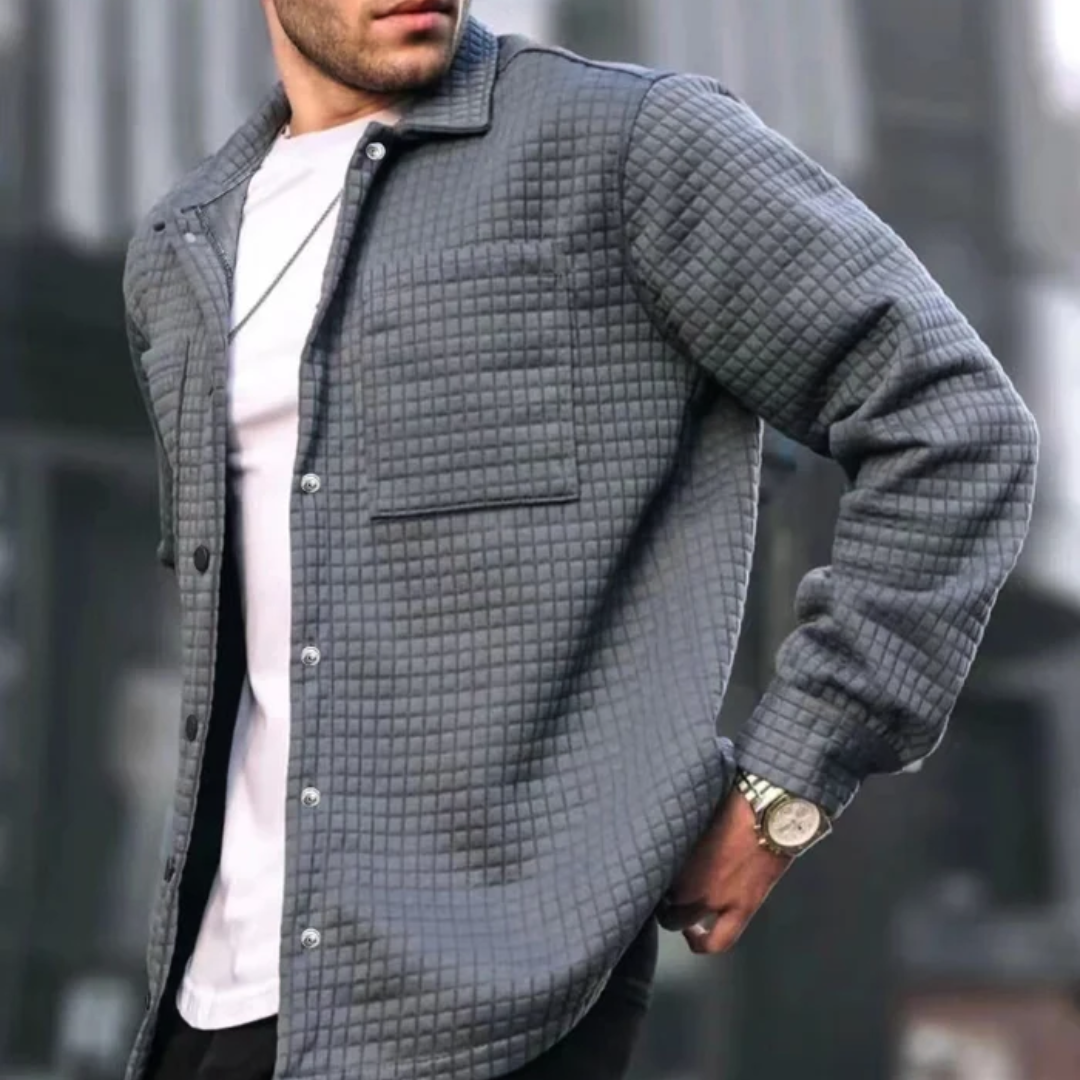 Gray quilted casual jacket with button front and chest pocket detail