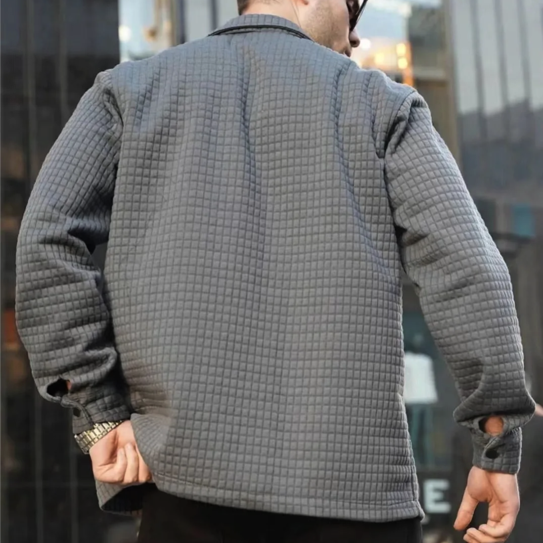 Gray quilted casual jacket, back view with ribbed hem and cuffs
