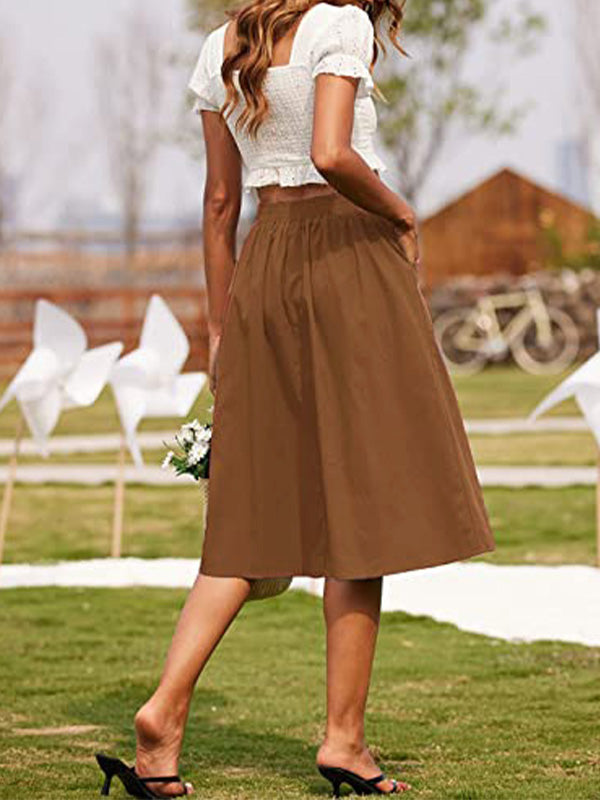 Brown A-line skirt with button front and elastic waistband, knee-length