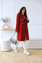Red long double-breasted overcoat with gold buttons and flap chest pockets