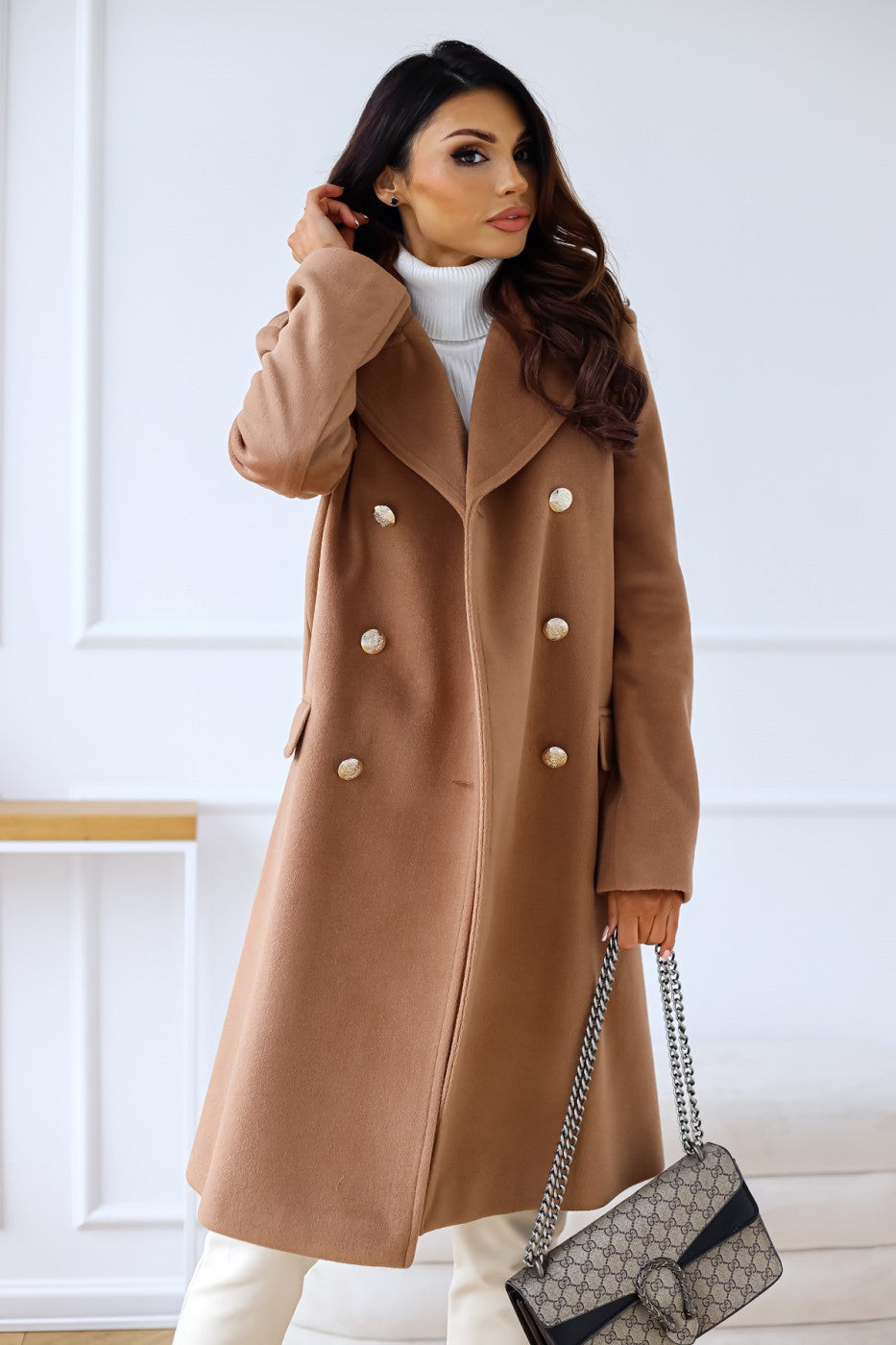 Camel brown long double-breasted overcoat with gold buttons and beltless tailored fit