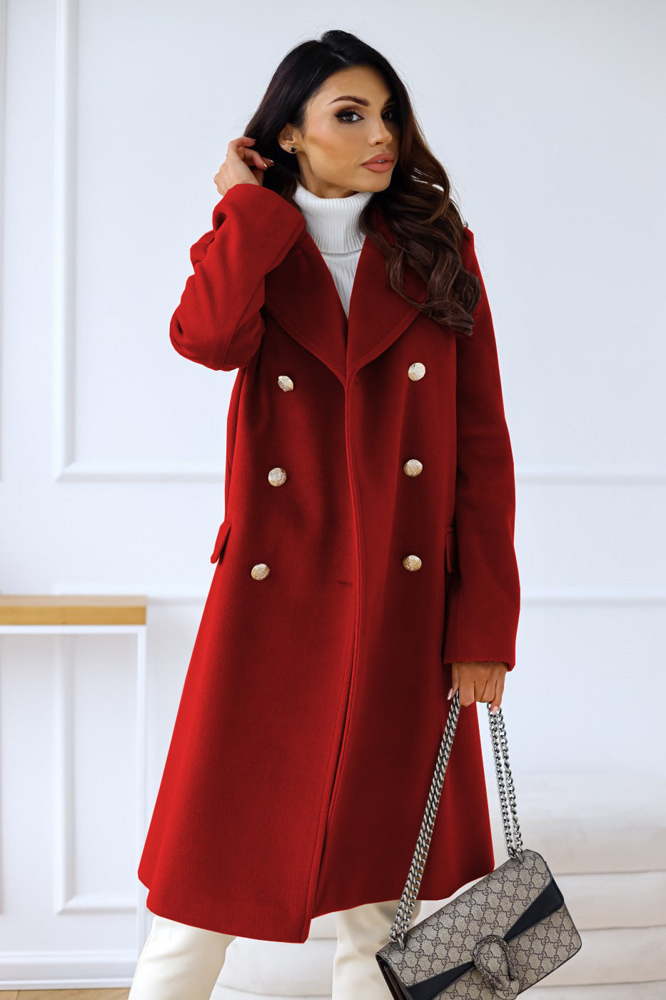 Deep red long double-breasted overcoat with gold buttons and wide lapels