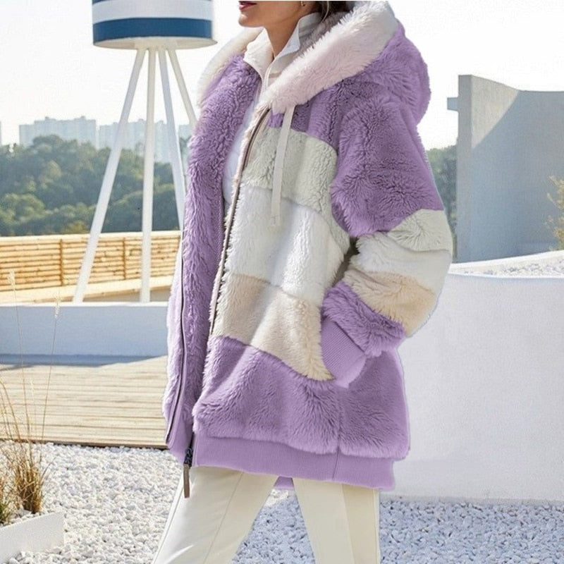 Purple plush hooded vest with cream and pale yellow patchwork, front zipper, sherpa texture