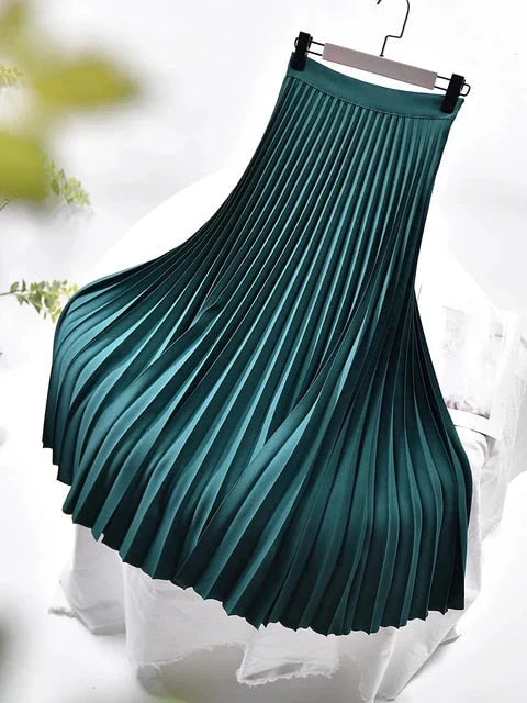 Green women's pleated high-waist A-line maxi skirt with flared pleats and waistband