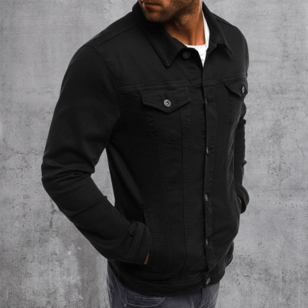 Black denim jacket with button-front and two flap chest pockets