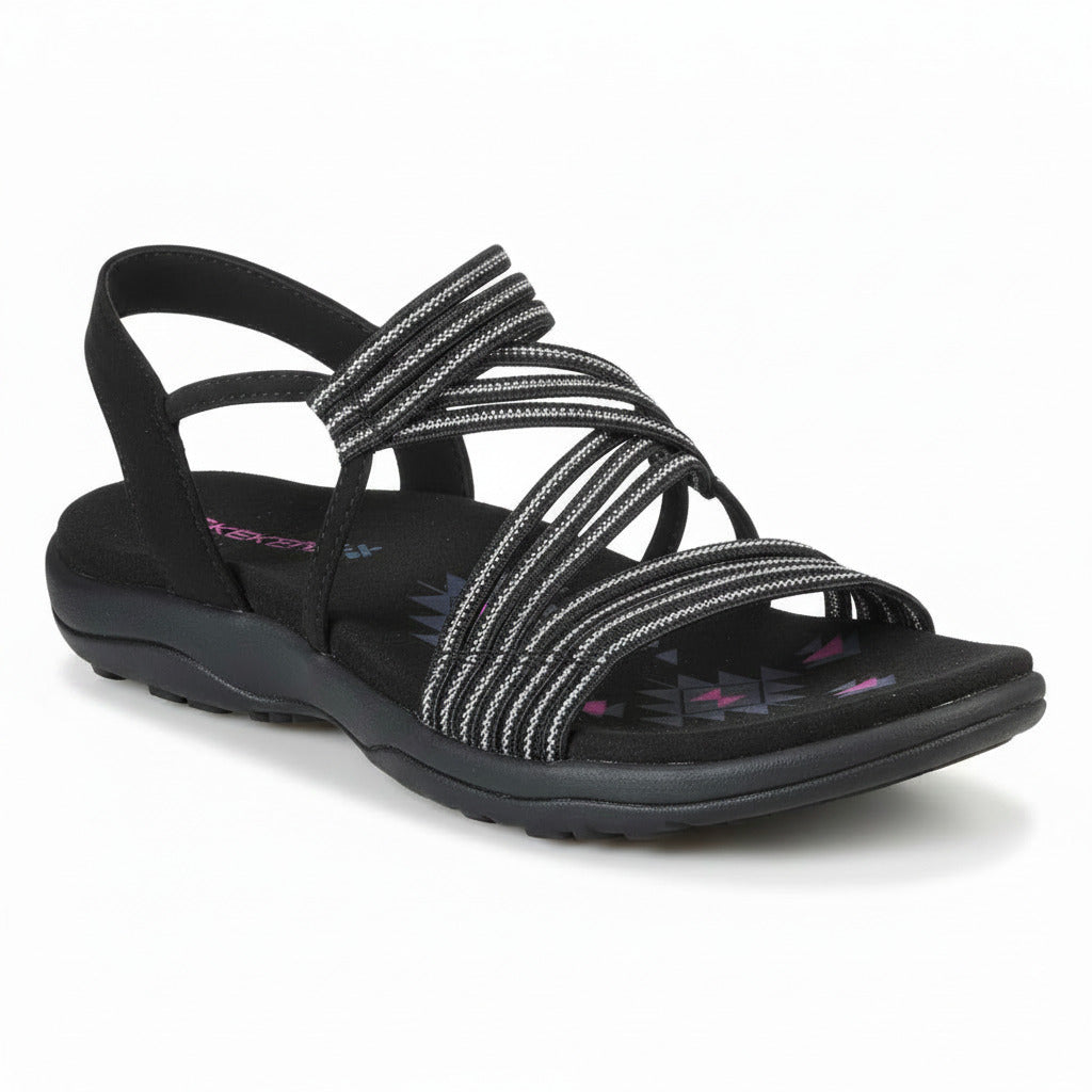 Black slip-on sandals with striped crisscross straps, open toe, and cushioned sole