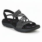 Black slip-on sandals with striped crisscross straps, open toe, and cushioned sole