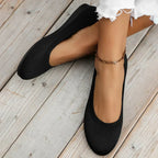 Black stretch knit slip-on ballerina flats with rounded toe