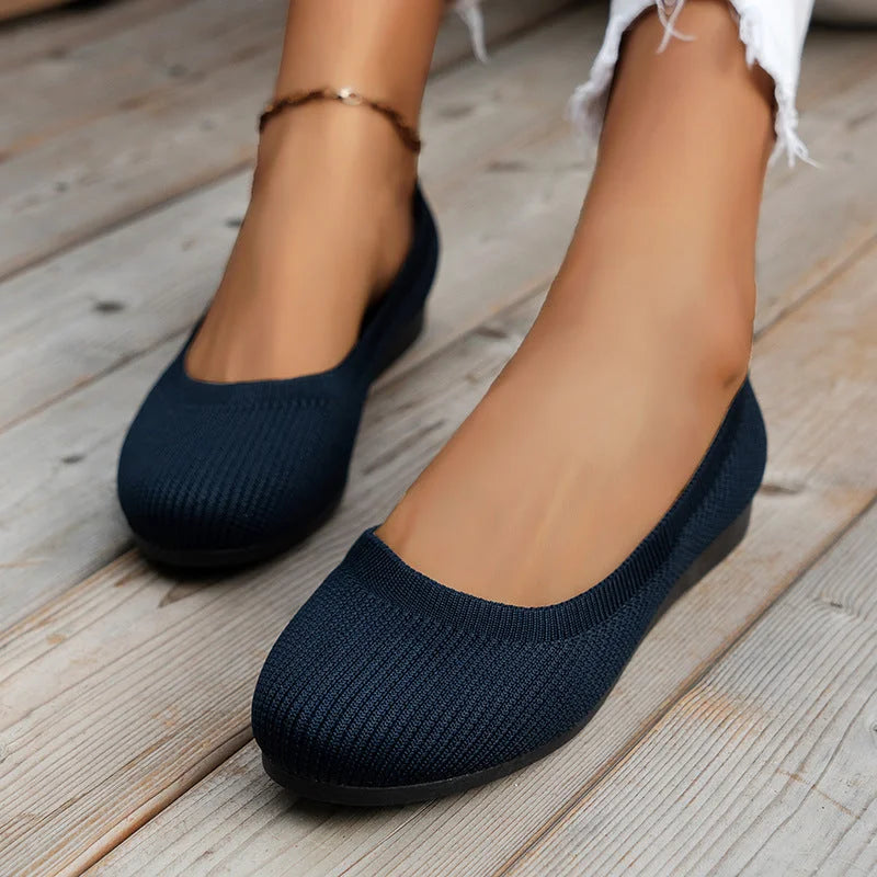 Navy stretch knit slip-on ballerina flats with rounded toe