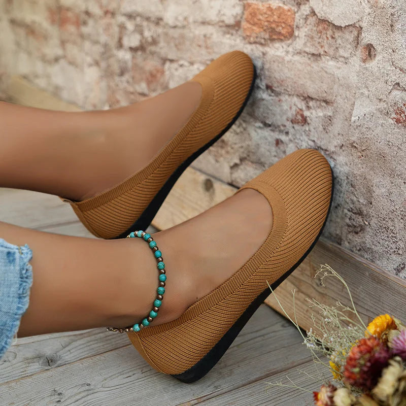 Tan stretch knit slip-on ballerina flats with rounded toe