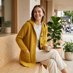 Mustard yellow longline knit cardigan with button front and front patch pockets