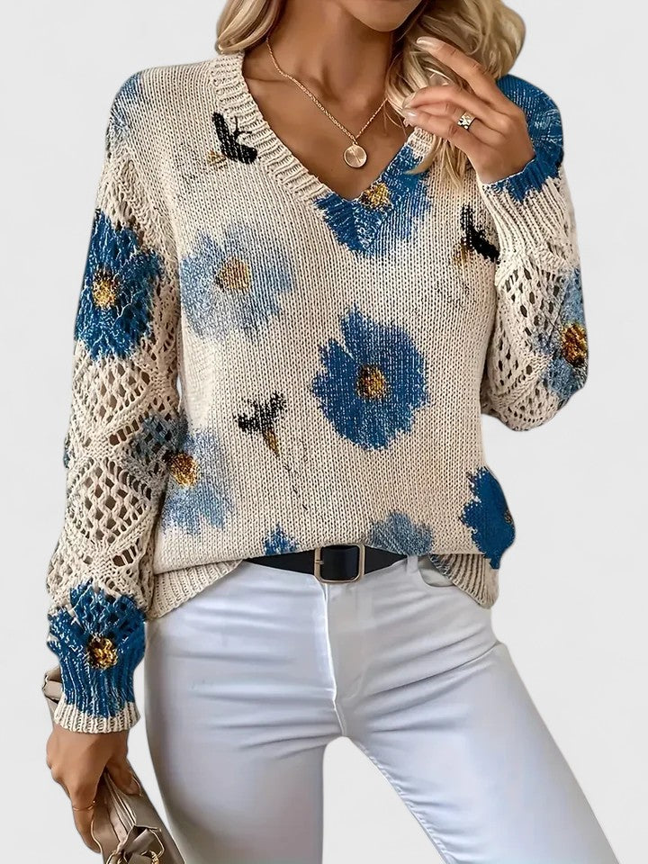 Floral knit cardigan in cream with blue flower print, V-neck and ribbed hem cuffs